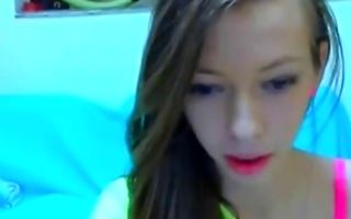 Naughty brunette amateur masturbates her clit in solo